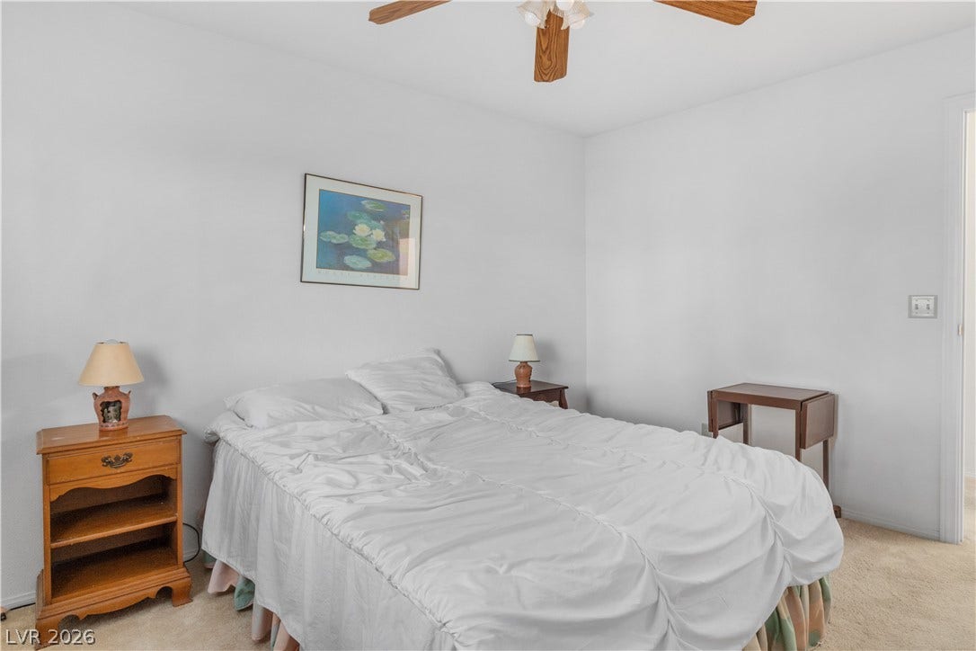 Third Bedroom with carpet floors, a ceiling fan, and baseboards