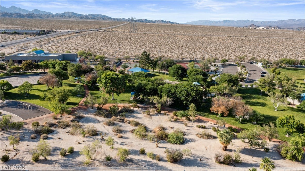 Bird's eye view of public park with a mountainous background