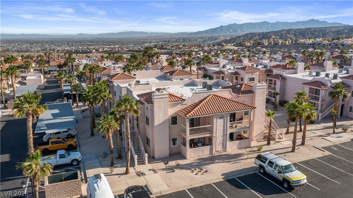 Aerial perspective of suburban area featuring mountains