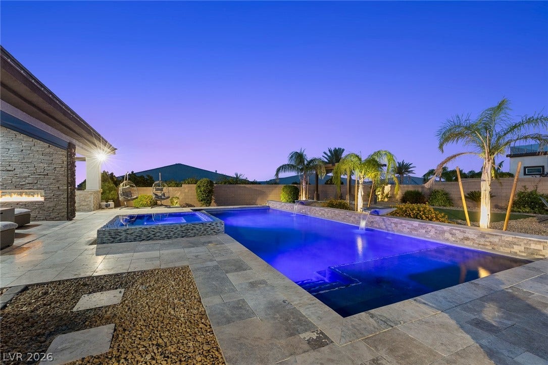 9841 W El Campo Grande Avenue, Las Vegas, NV 89149 An inviting private pool and spa create a serene backyard oasis, perfect for relaxation.
