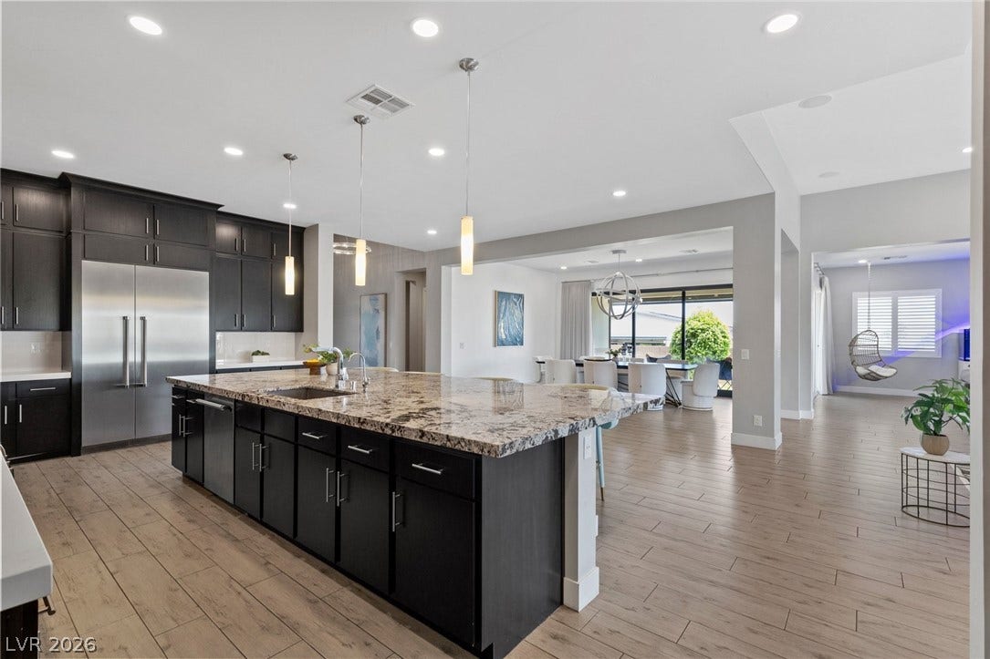 9841 W El Campo Grande Avenue, Las Vegas, NV 89149 Culinary dreams come to life in this modern kitchen with ample counter space and state-of-the-art appliances