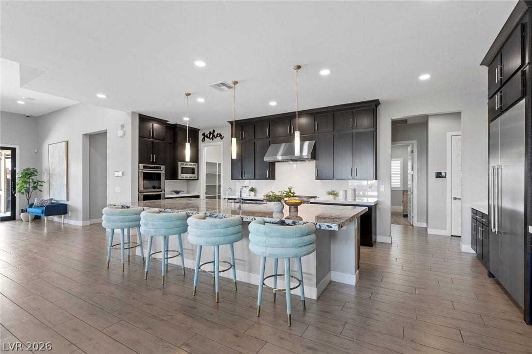 9841 W El Campo Grande Avenue, Las Vegas, NV 89149 Culinary dreams come to life in this modern kitchen with ample counter space and state-of-the-art appliances