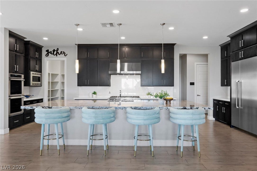 9841 W El Campo Grande Avenue, Las Vegas, NV 89149 Culinary dreams come to life in this modern kitchen with ample counter space and state-of-the-art appliances.