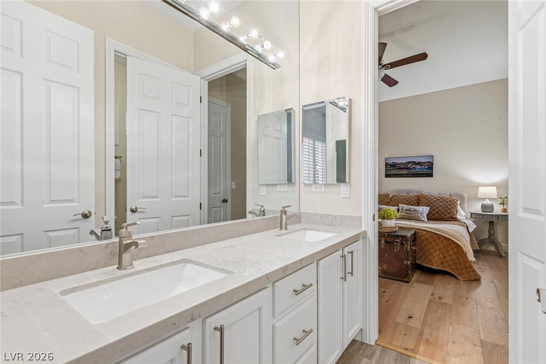Clean lines and a spacious double vanity elevate this modern bathroom design.