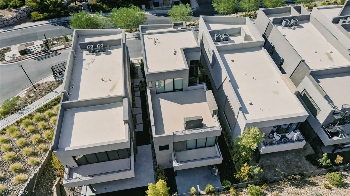 Striking contemporary architecture defines this multi-level home featuring clean lines and private terraces.