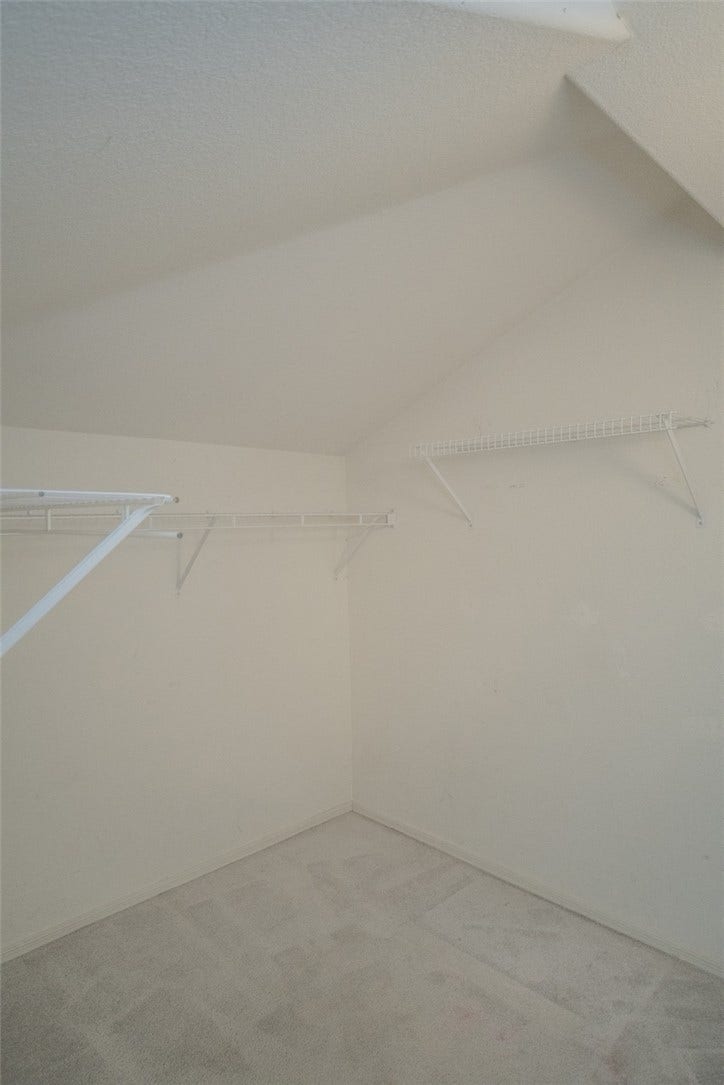 121 Heather Drive, Henderson, NV 89002 A vaulted ceiling and soft carpeting enhance this functional walk-in closet space.