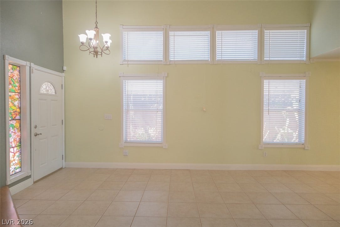 121 Heather Drive, Henderson, NV 89002 High ceilings and clerestory windows bring abundant natural light to this tile-floored entryway.