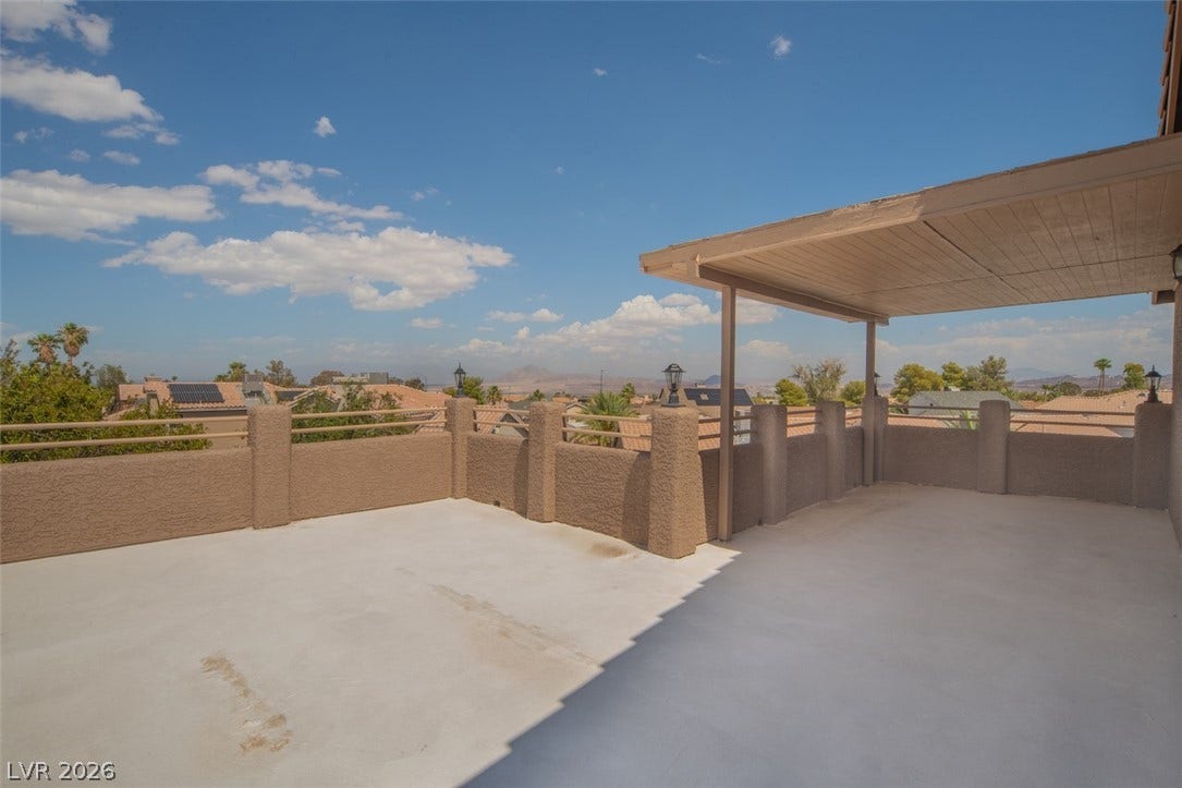 121 Heather Drive, Henderson, NV 89002 A spacious rooftop terrace boasts a protective partial cover and sweeping neighborhood views.