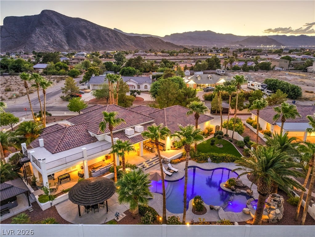 Dramatic mountain vistas provide a scenic backdrop for this luxurious desert oasis.