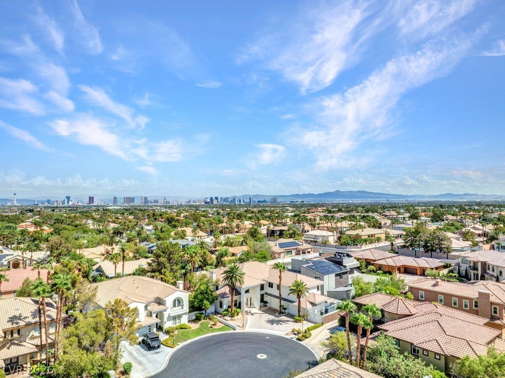 1632 Marbella Ridge Court, Las Vegas, NV 89117 Panoramas sweep across the neighborhood to the distant city skyline under open desert skies.