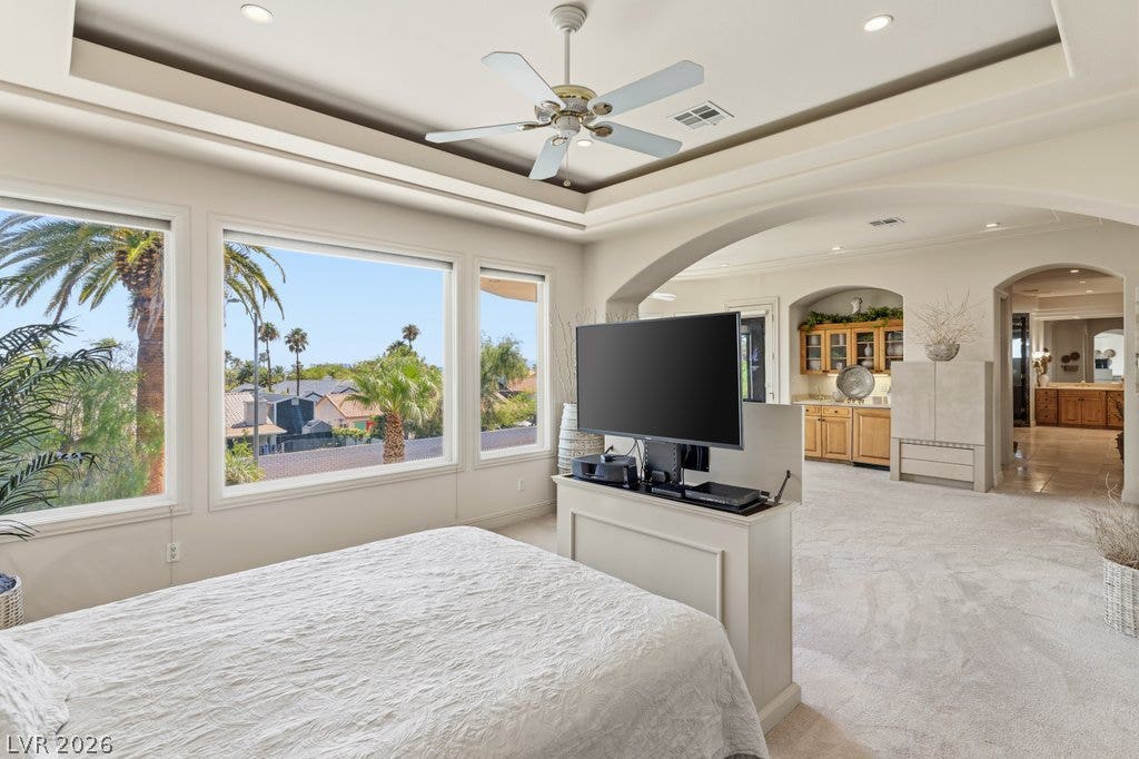 1632 Marbella Ridge Court, Las Vegas, NV 89117 Generous windows frame neighborhood views from this spacious suite with an elegant tray ceiling.