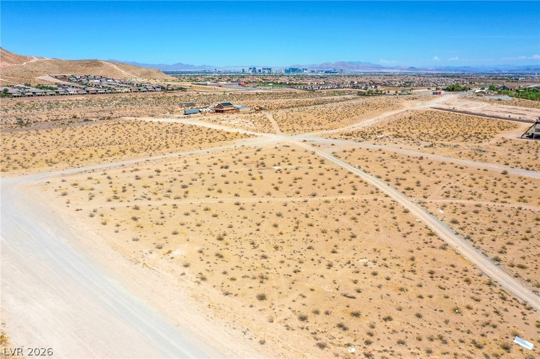 0 SE Corner of Hualapai & Pebble, Las Vegas, NV 89178 Vast desert acreage offers potential building sites with sweeping views of the distant city skyline.