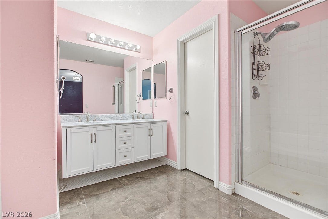 911 Sterling Thorn Court, Las Vegas, NV 89183 Walk-in shower, dual sinks, enclosed toilet room.