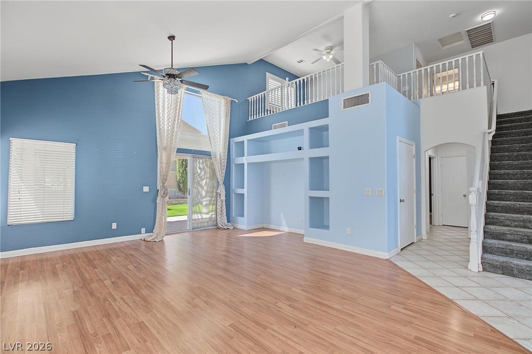 911 Sterling Thorn Court, Las Vegas, NV 89183 Soaring ceilings and an open loft overlook the versatile main living area.