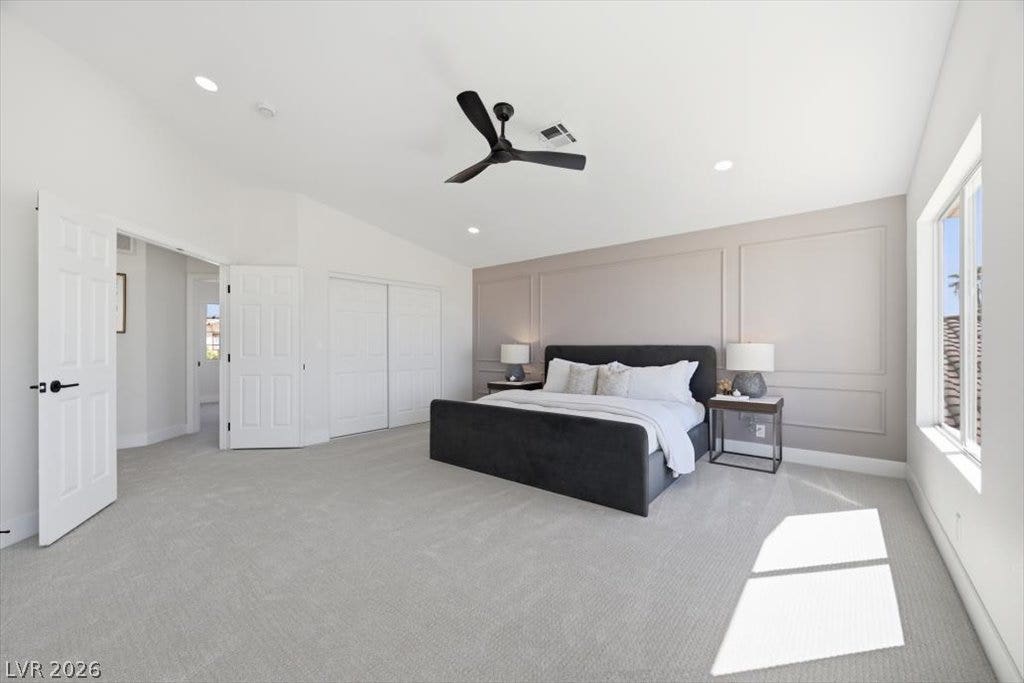 139 Skytop Drive, Henderson, NV 89015 Vaulted ceilings and generous space define this expansive, light-filled bedroom suite.