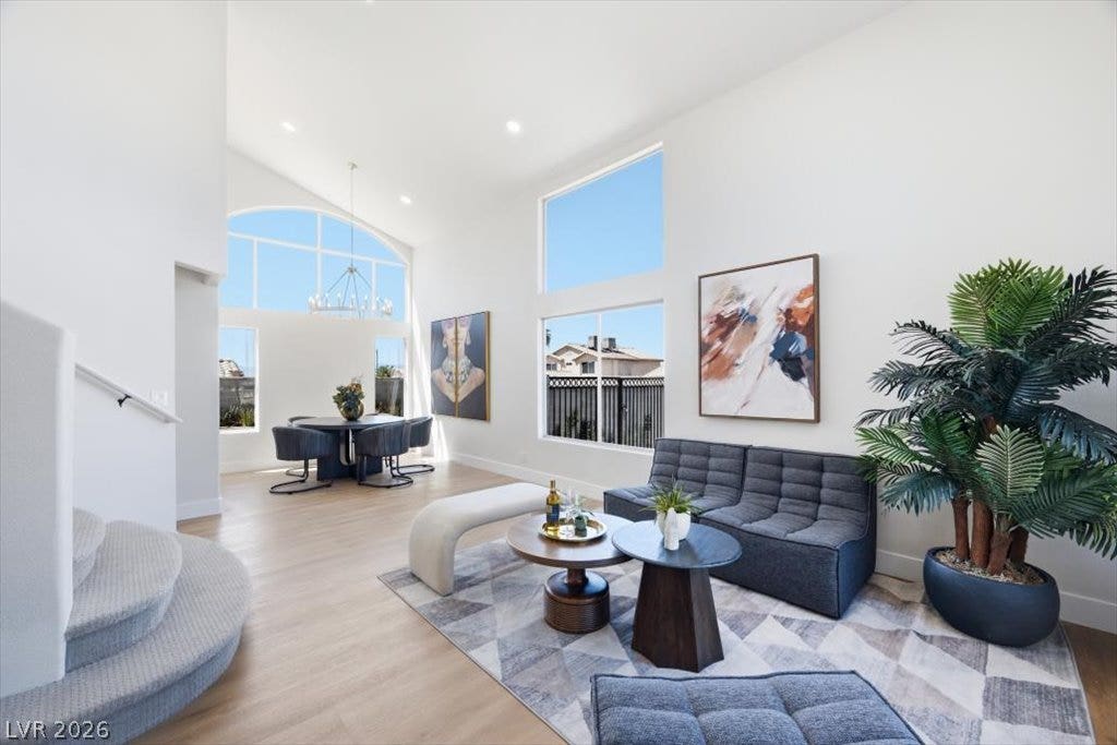 139 Skytop Drive, Henderson, NV 89015 Towering ceilings and large windows fill this open space with abundant natural light.