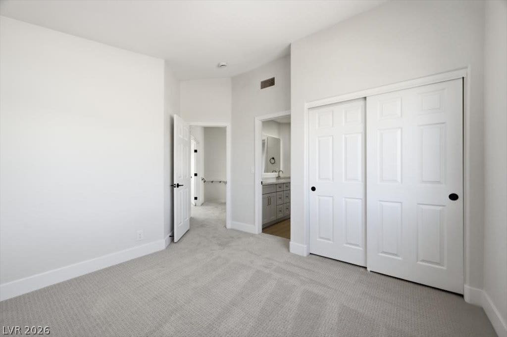 139 Skytop Drive, Henderson, NV 89015 Upstairs bedroom two with attached full bathroom.