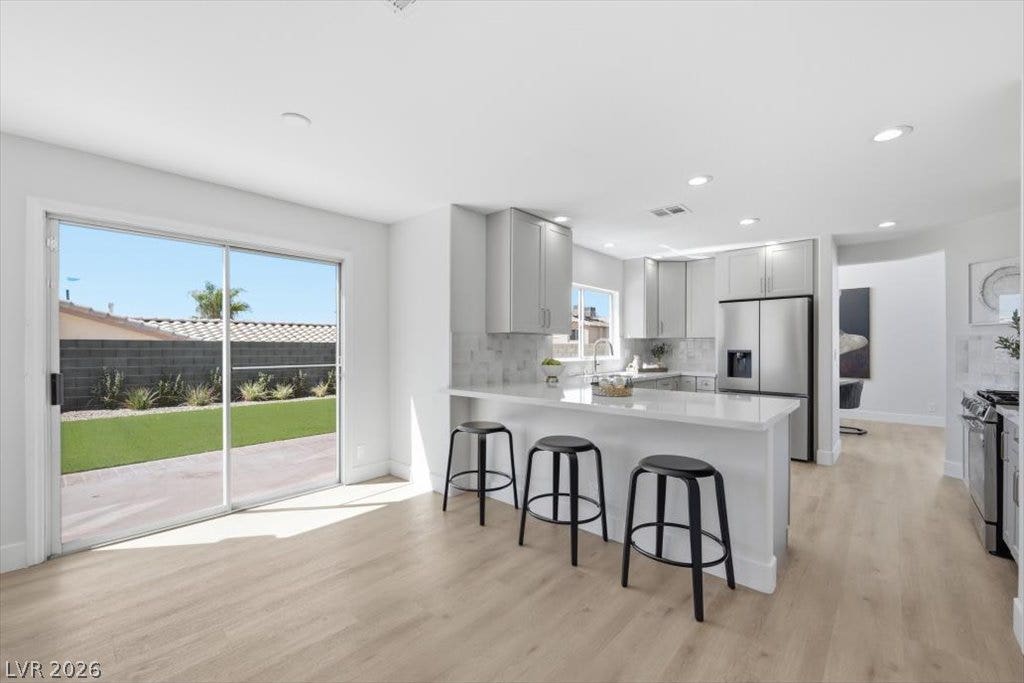 139 Skytop Drive, Henderson, NV 89015 An open kitchen layout flows seamlessly into an additional dining area.