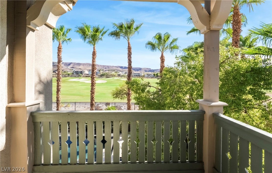1343 Quiet River Avenue, Henderson, NV 89012 Palm trees and rolling greens frame the scenic golf course vista from this covered balcony.