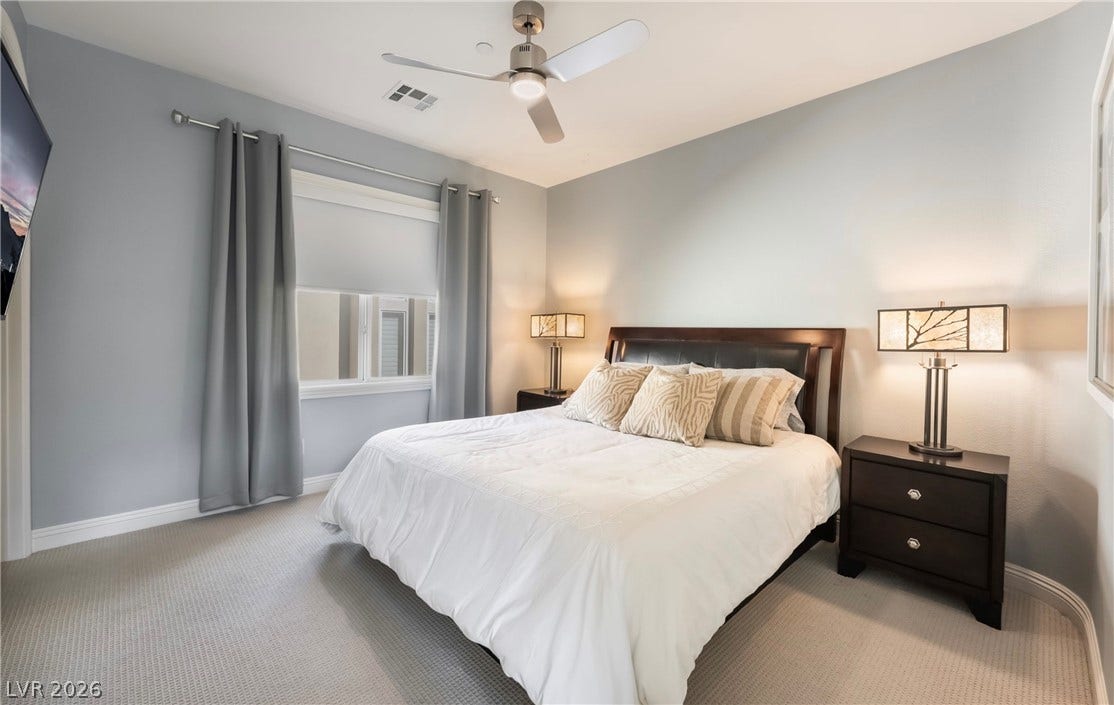 1343 Quiet River Avenue, Henderson, NV 89012 Plush carpeting and soft natural light create a peaceful and inviting atmosphere.