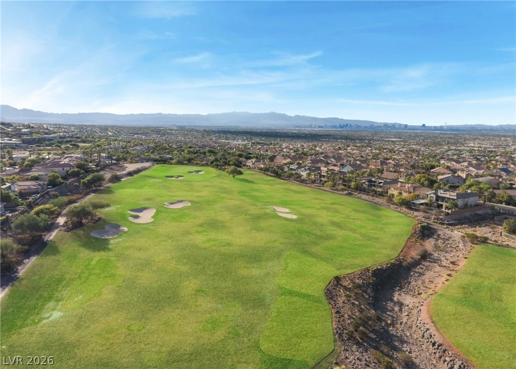 1343 Quiet River Avenue, Henderson, NV 89012 Unobstructed desert and mountain panoramas frame this beautiful golf course frontage location.