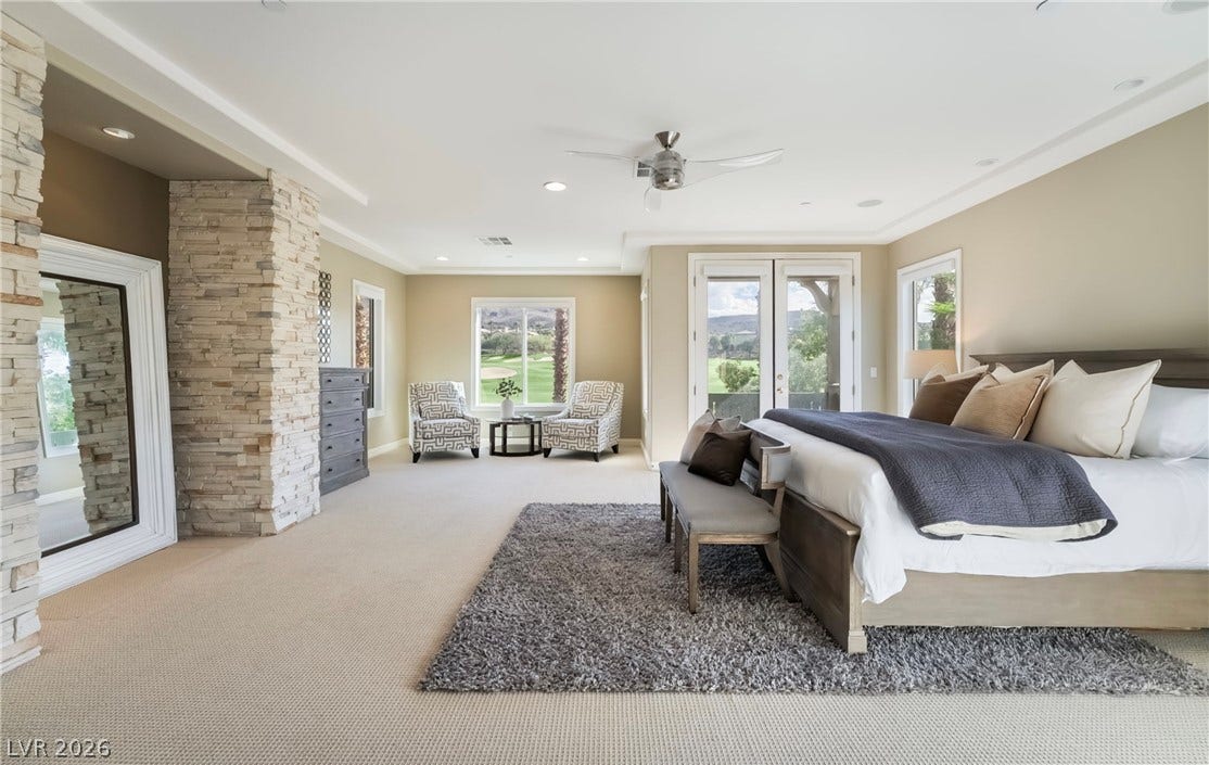 1343 Quiet River Avenue, Henderson, NV 89012 Recessed lighting, soft carpeting, and a stone accent column define this spacious retreat.