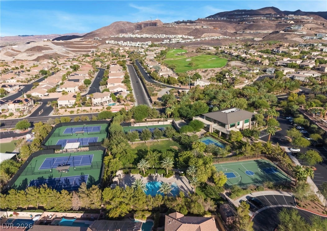 1343 Quiet River Avenue, Henderson, NV 89012 Scenic mountain vistas frame this master-planned community featuring prime sports courts and premium amenities.