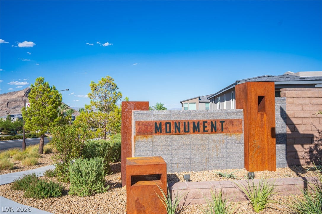 2545 Monolith Street, Las Vegas, NV 89138 An inviting stone and metal entry monument establishes a sense of arrival at the community.