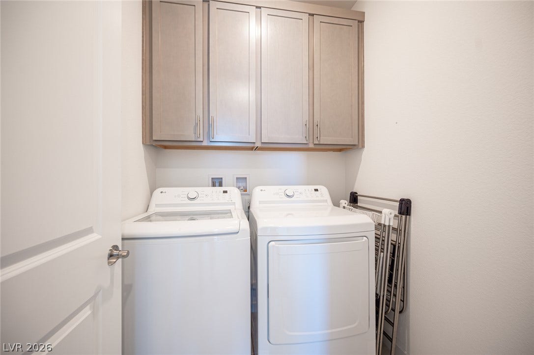 2545 Monolith Street, Las Vegas, NV 89138 Ample overhead cabinetry maximizes storage potential in this dedicated utility space.