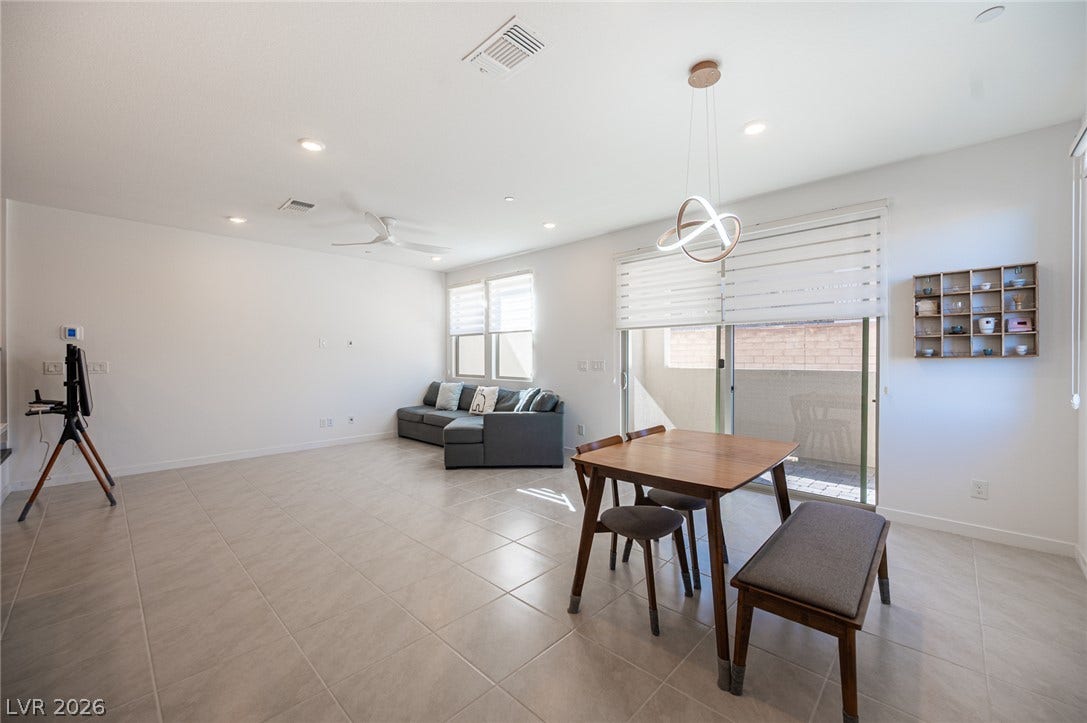 2545 Monolith Street, Las Vegas, NV 89138 Tiled floors and clean lines define this versatile open living space.