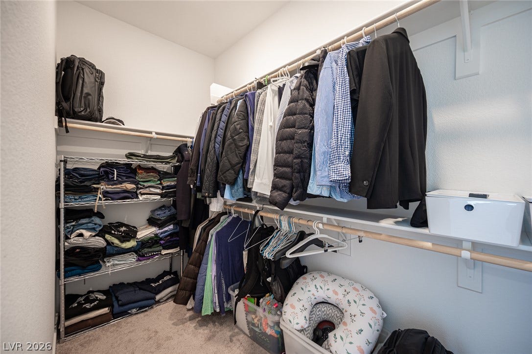 2545 Monolith Street, Las Vegas, NV 89138 A spacious walk-in closet provides abundant hanging rods and integrated storage shelving.