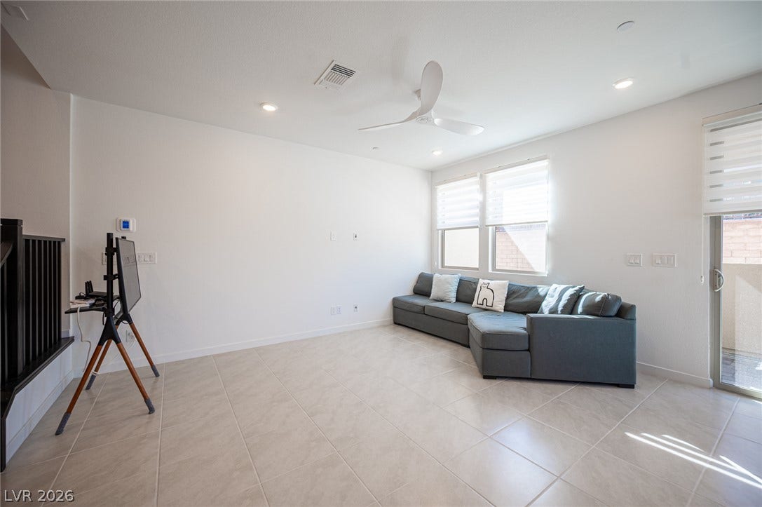 2545 Monolith Street, Las Vegas, NV 89138 High ceilings and clean tile flooring enhance this open second-level living space.