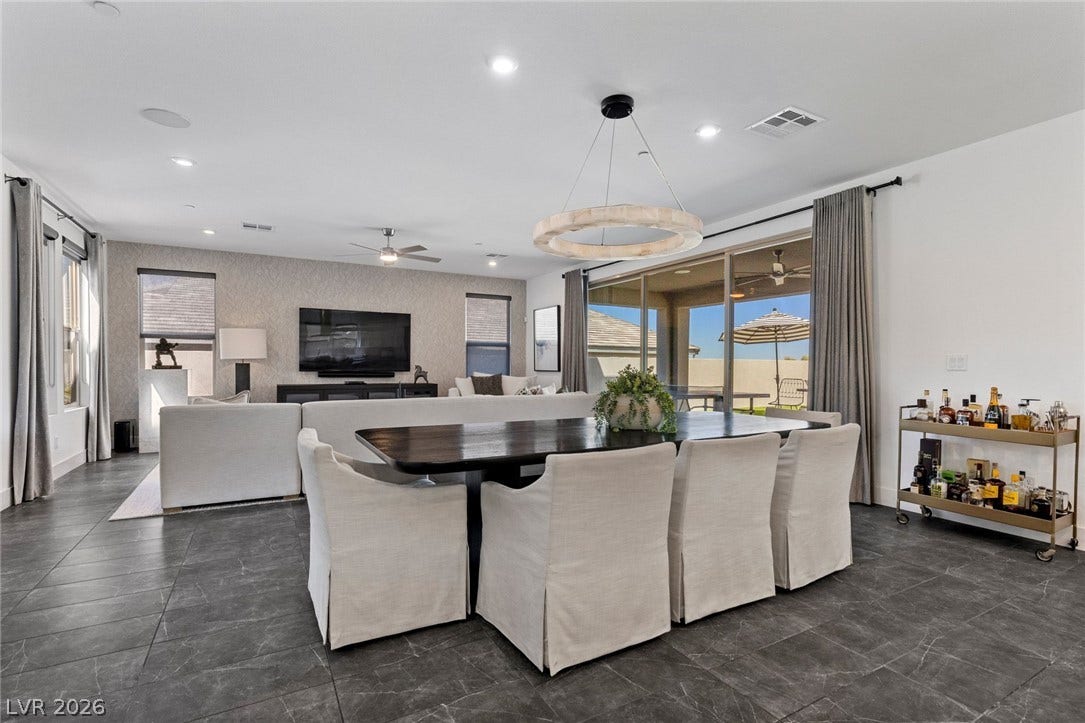 1976 Peaceful Mesa Court, Henderson, NV 89052 An open floorplan seamlessly connects the dining space to the main living area.