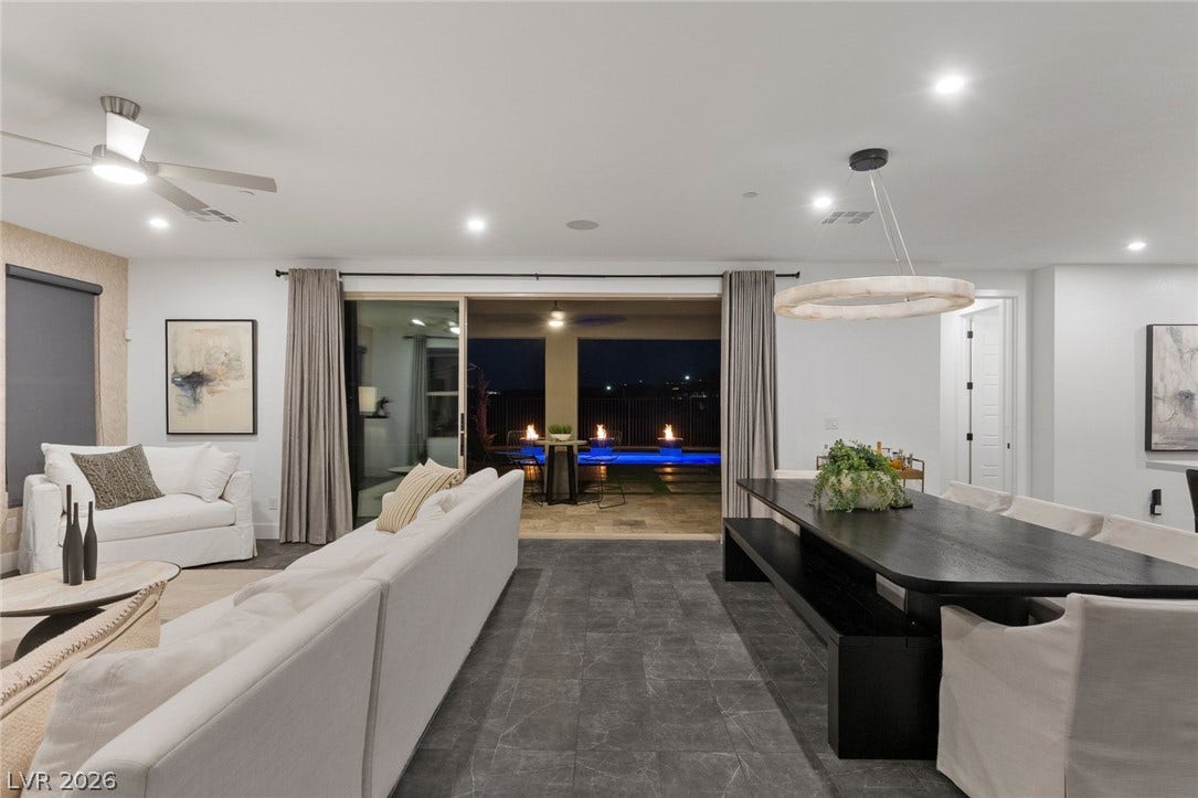 1976 Peaceful Mesa Court, Henderson, NV 89052 An open floorplan seamlessly transitions from indoor dining to a patio overlooking the pool.