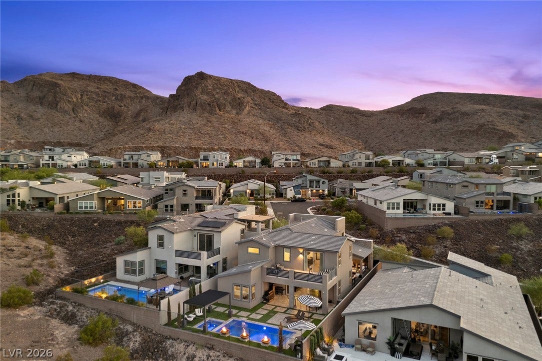 1976 Peaceful Mesa Court, Henderson, NV 89052 Dramatic mountain backdrops frame these modern desert homes and their pristine backyard pools.