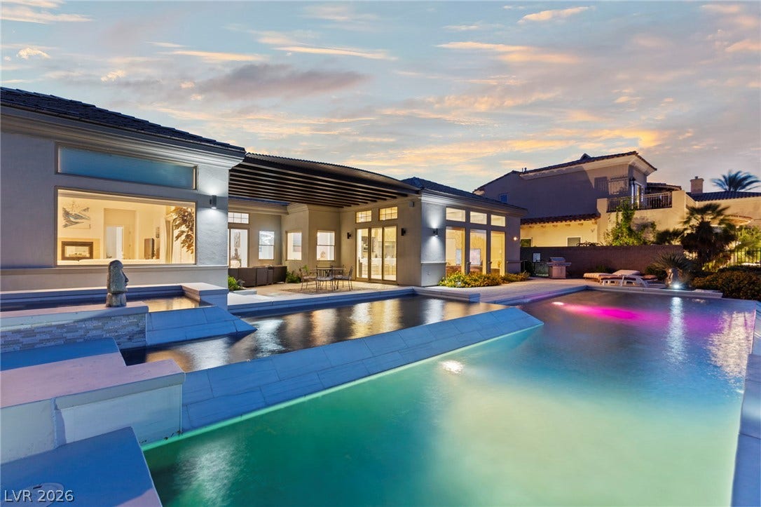 1358 Opal Valley Street, Henderson, NV 89052 Infinity Pool-Backyard oasis features a multi-tiered pool and a covered patio.