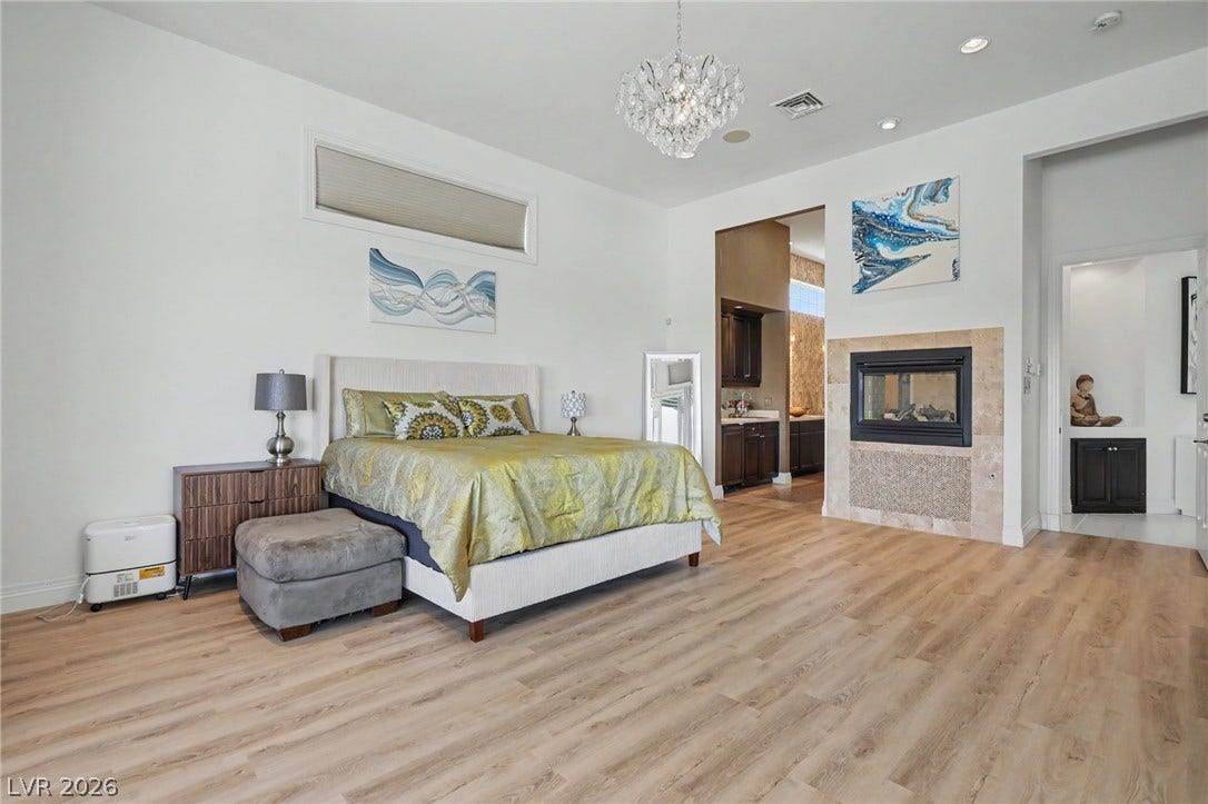 1358 Opal Valley Street, Henderson, NV 89052 Primary Suite with dual Fireplace