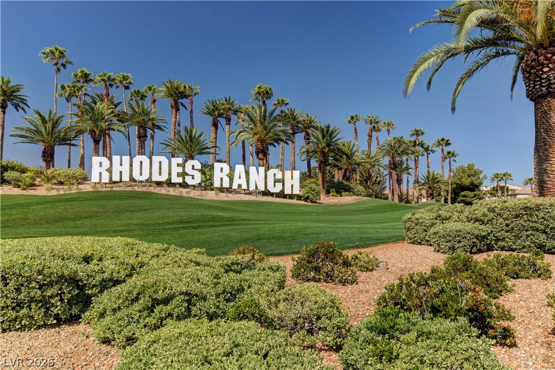 218 Crooked Putter Drive, Las Vegas, NV 89148 Lush manicured turf and towering palm trees frame the welcoming community landmark.