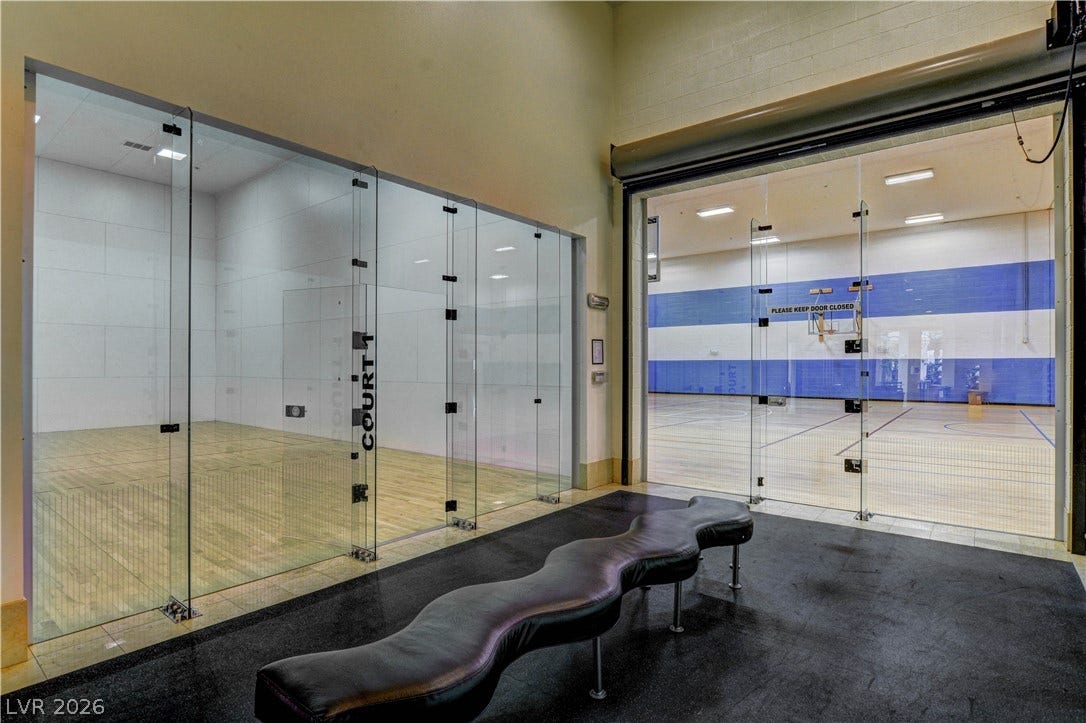 218 Crooked Putter Drive, Las Vegas, NV 89148 Professional indoor athletic courts feature polished wood flooring and secure glass viewing walls.