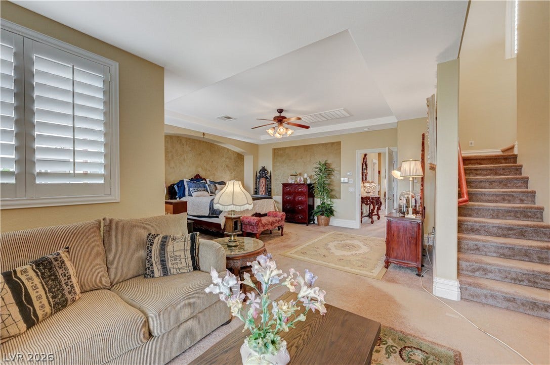 218 Crooked Putter Drive, Las Vegas, NV 89148 Recessed ceiling details and custom window shutters elevate this versatile multi-level suite.