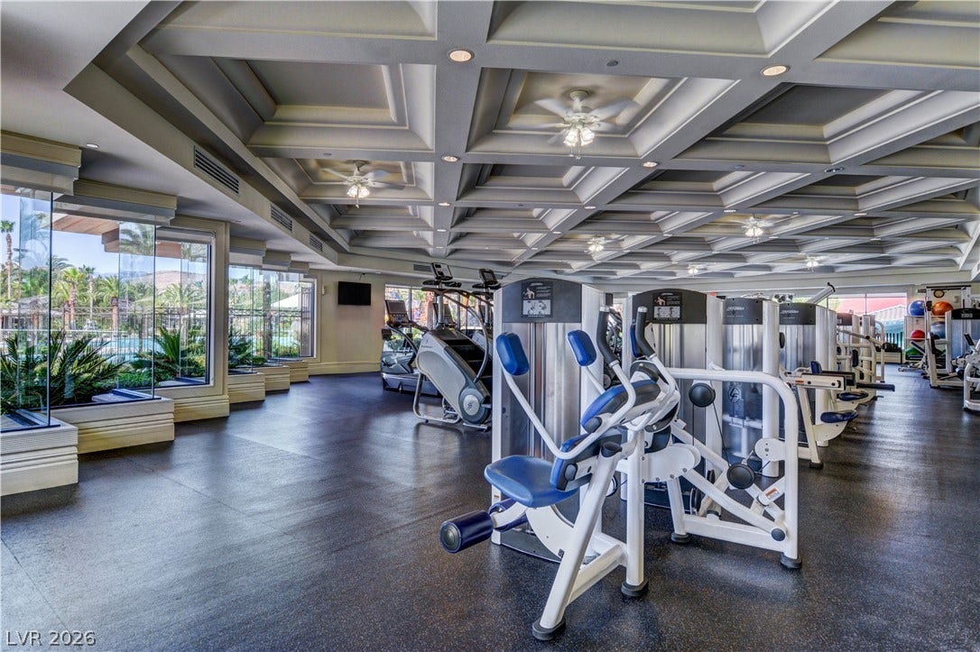 218 Crooked Putter Drive, Las Vegas, NV 89148 An elegant coffered ceiling and expansive windows define this well-appointed fitness center.