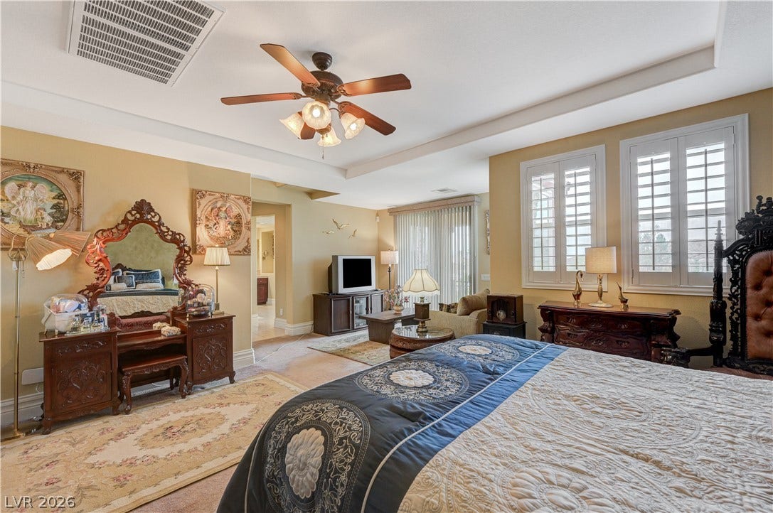 218 Crooked Putter Drive, Las Vegas, NV 89148 Plentiful windows with plantation shutters fill this spacious bedroom suite with natural light.