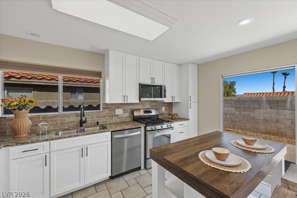 2432 Millcroft Drive, Henderson, NV 89074 Stainless appliances, new cabinets.