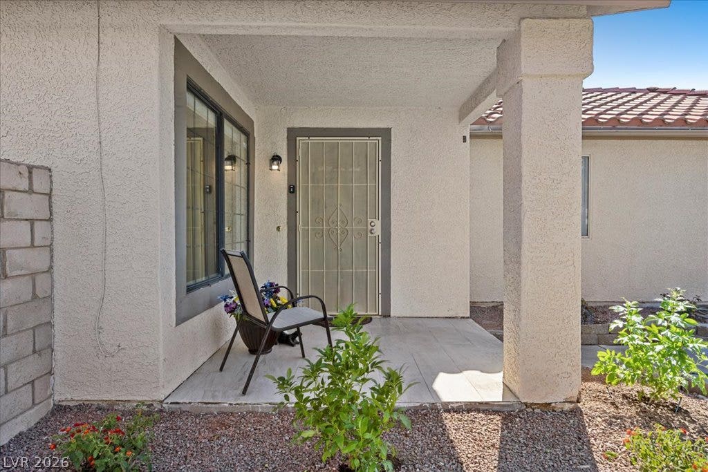 2432 Millcroft Drive, Henderson, NV 89074 An inviting covered entryway features tile flooring.
