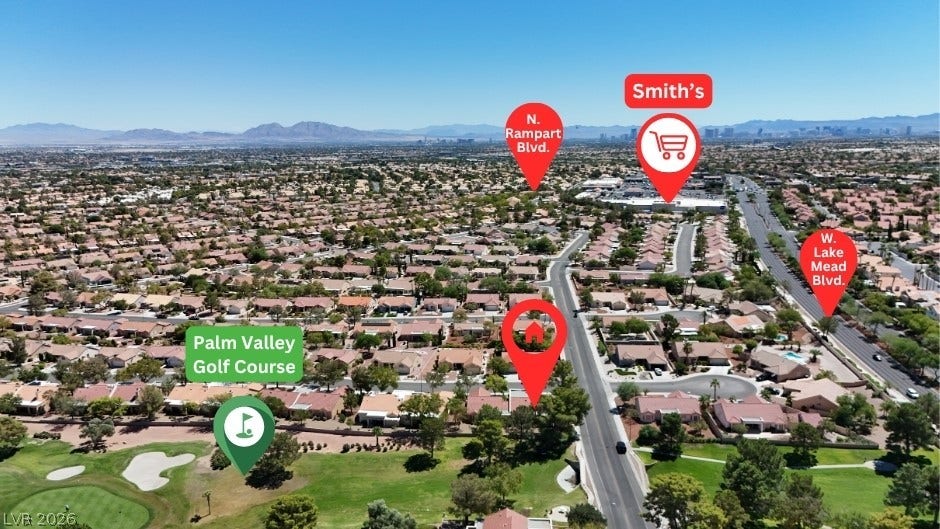 A bird's eye view showcases the neighborhood context and nearby golf course greens.