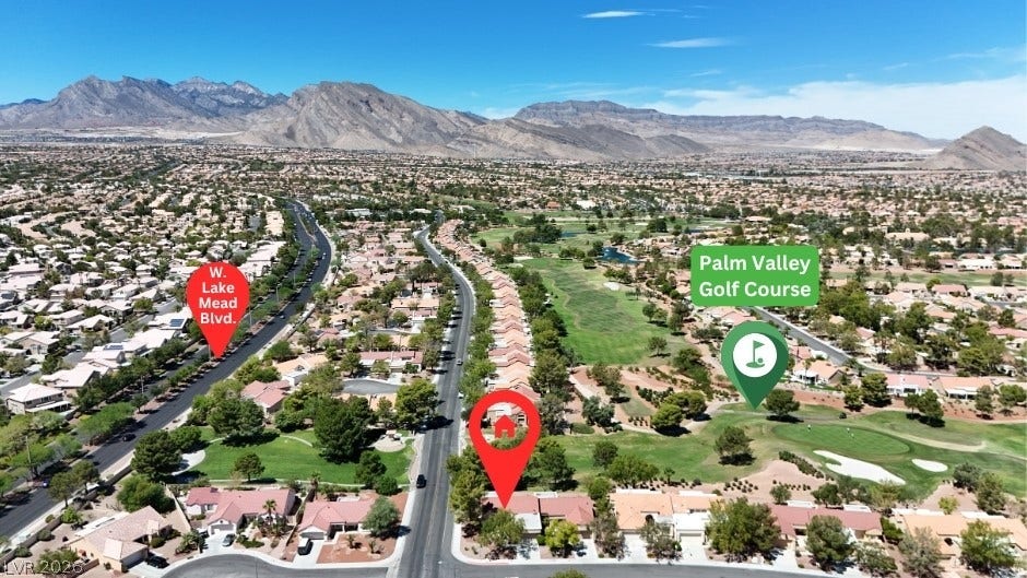 Panoramic mountain and golf course views frame this desirable desert neighborhood.