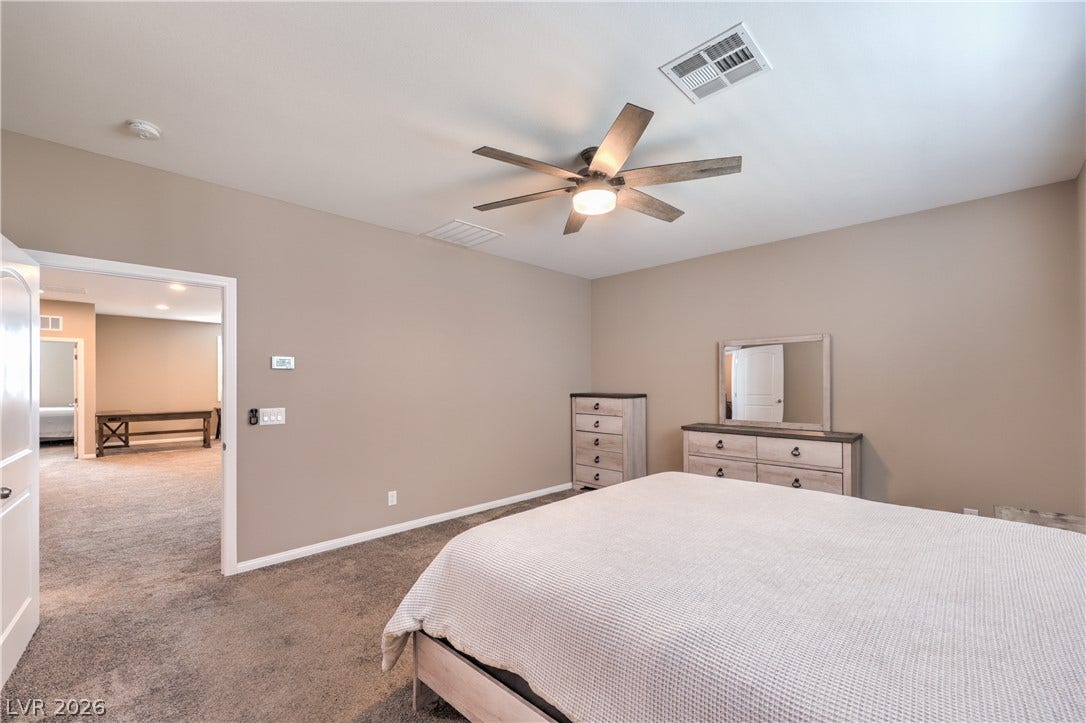 4658 Chestnut Tiger Street, North Las Vegas, NV 89031 Plush wall-to-wall carpeting flows seamlessly through this restful suite.