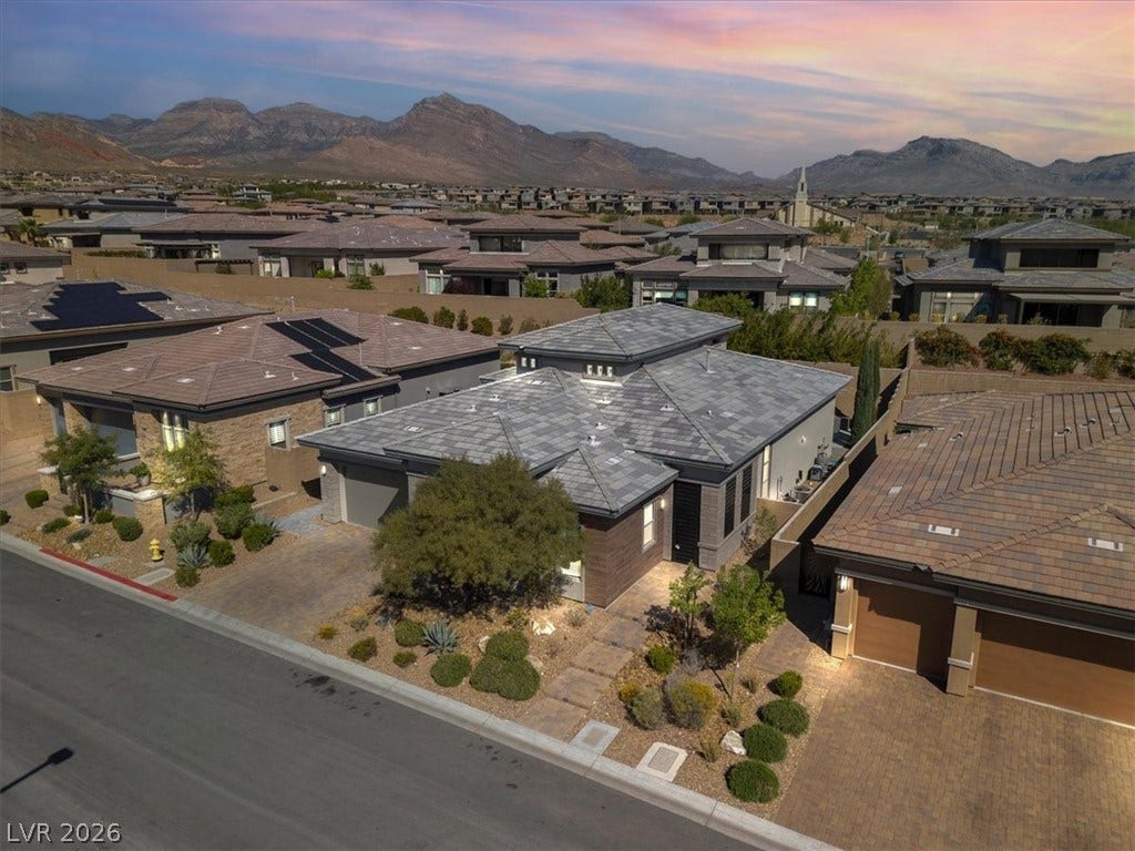 Aerial view at dusk of a mountain view and a residential view