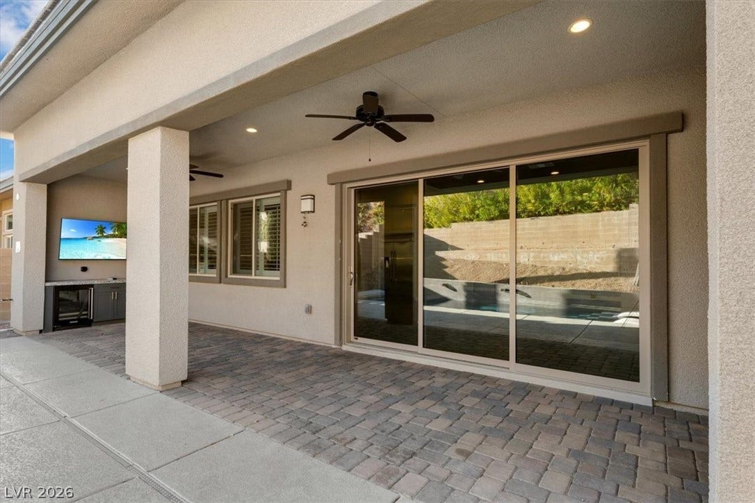 Private backyard oasis with pool, fire pit and dry bar with fridge and TV