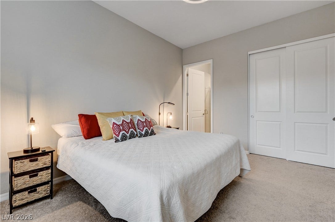 51 Thorn Creek Street, Henderson, NV 89011 Bedroom featuring light colored carpet and a closet